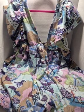 Floral Pastel Mini Dress with Deep V-Neck